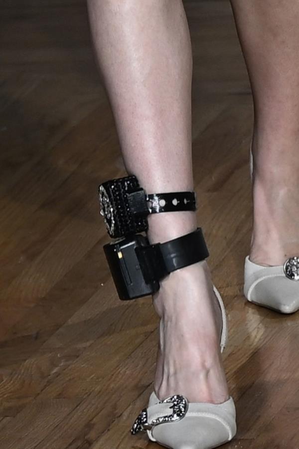 Anna DelVey spotted walking with her ankle monitor.